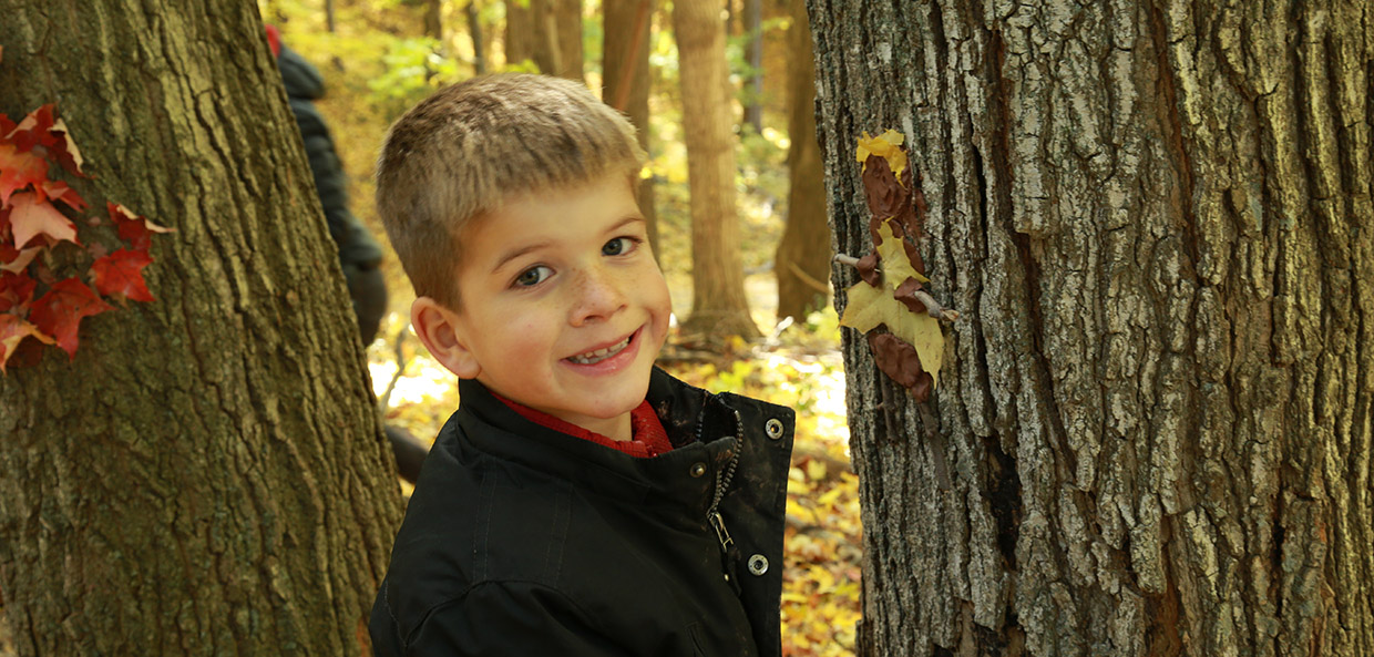 pre-teen boy takes part in education program at Kortright Centre