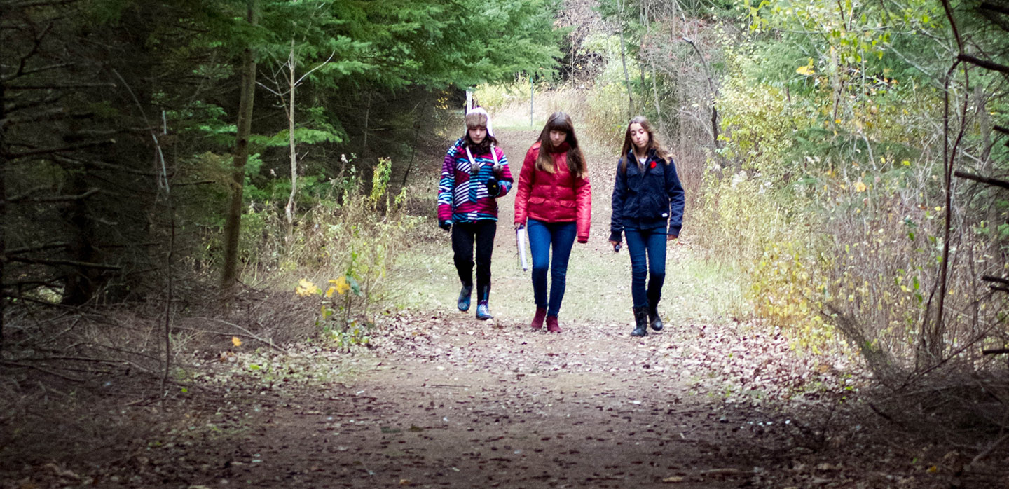 high school students explore trail at Kortright Centre for Conservation