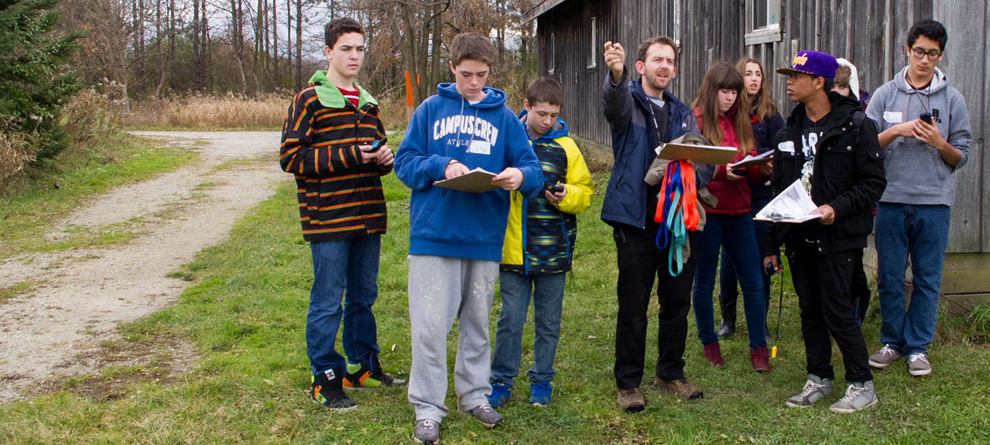 group of students practice GPS navigation at Kortright Centre