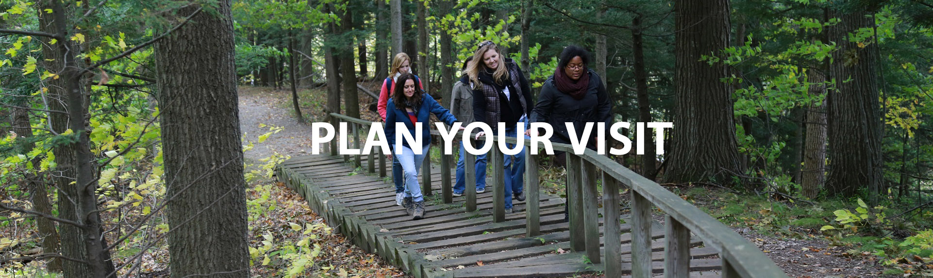 group of women explore trail at Kortright Centre