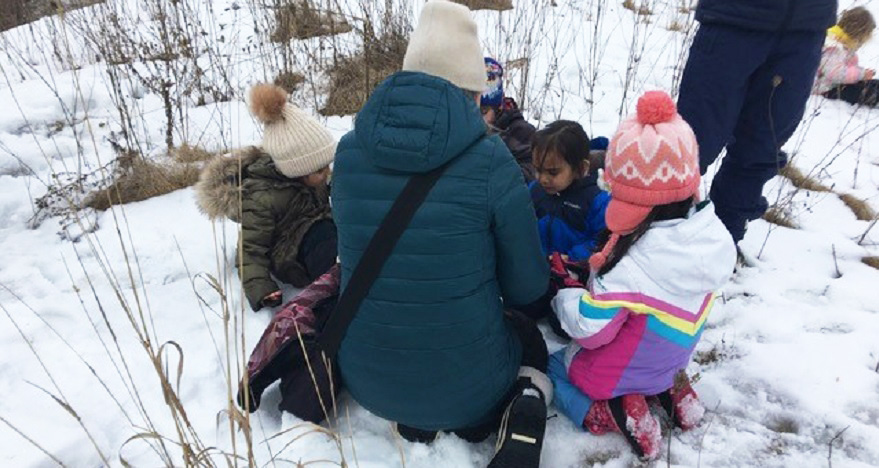 Educator at The Nature School helps preschoolers develop their self-regulation skills